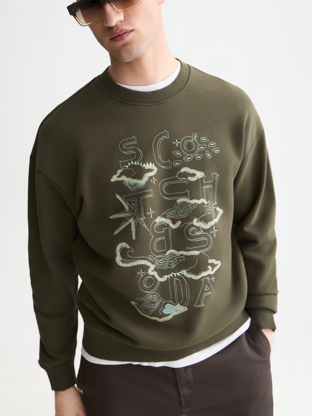 Front embroidered artwork relaxed-fit sweatshirt
