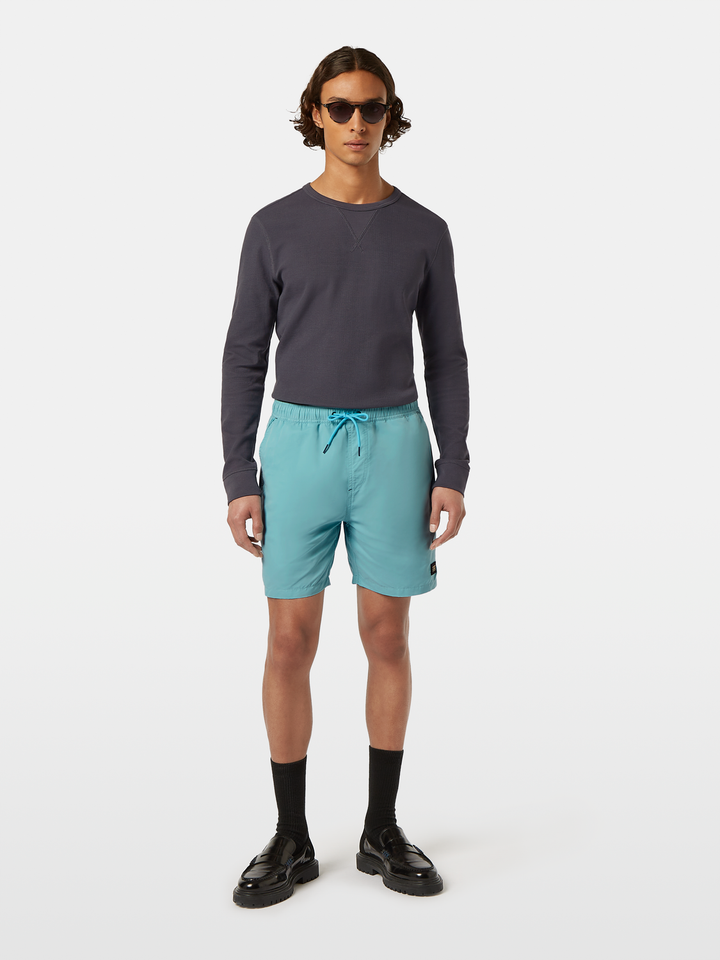 Solid mid-length swim shorts