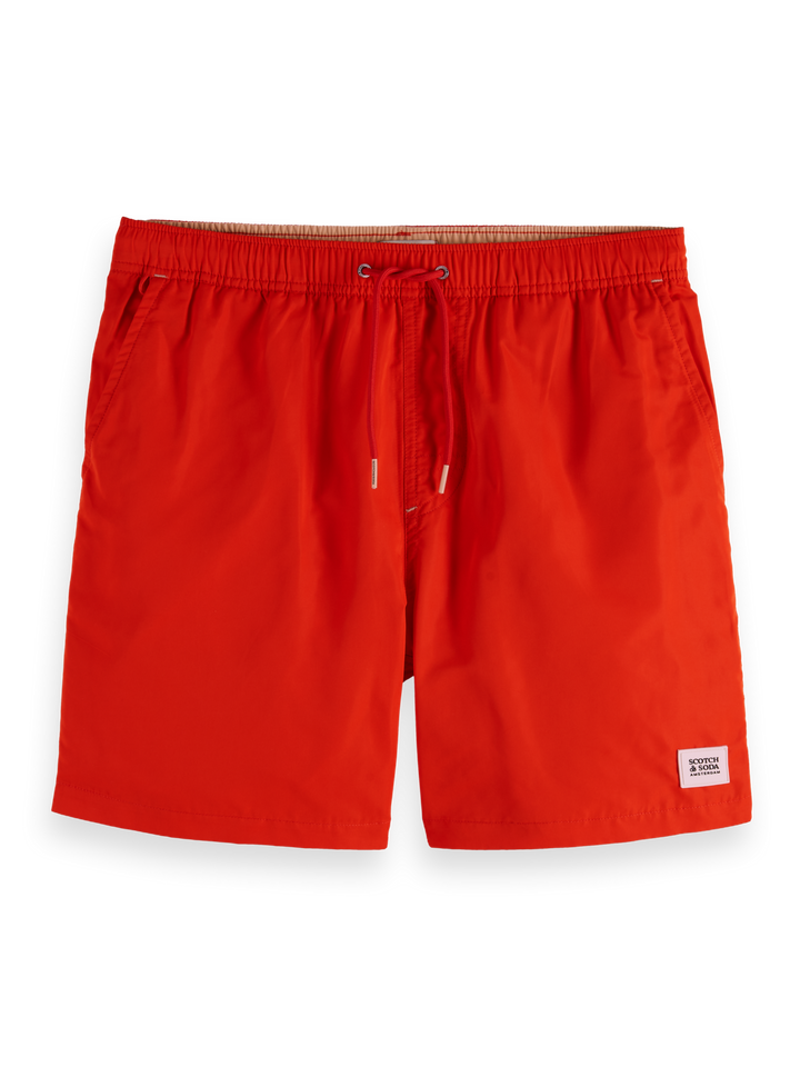 Solid mid-length swim shorts