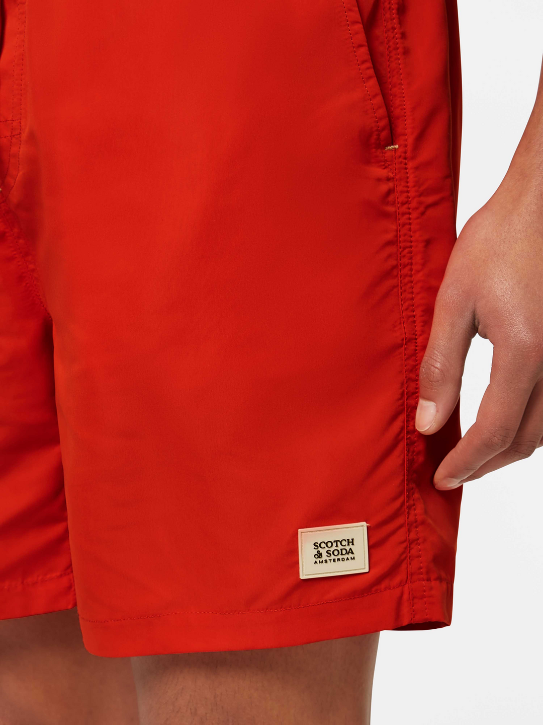 Solid mid-length swim shorts