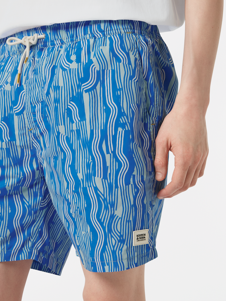 Printed mid-length swim shorts