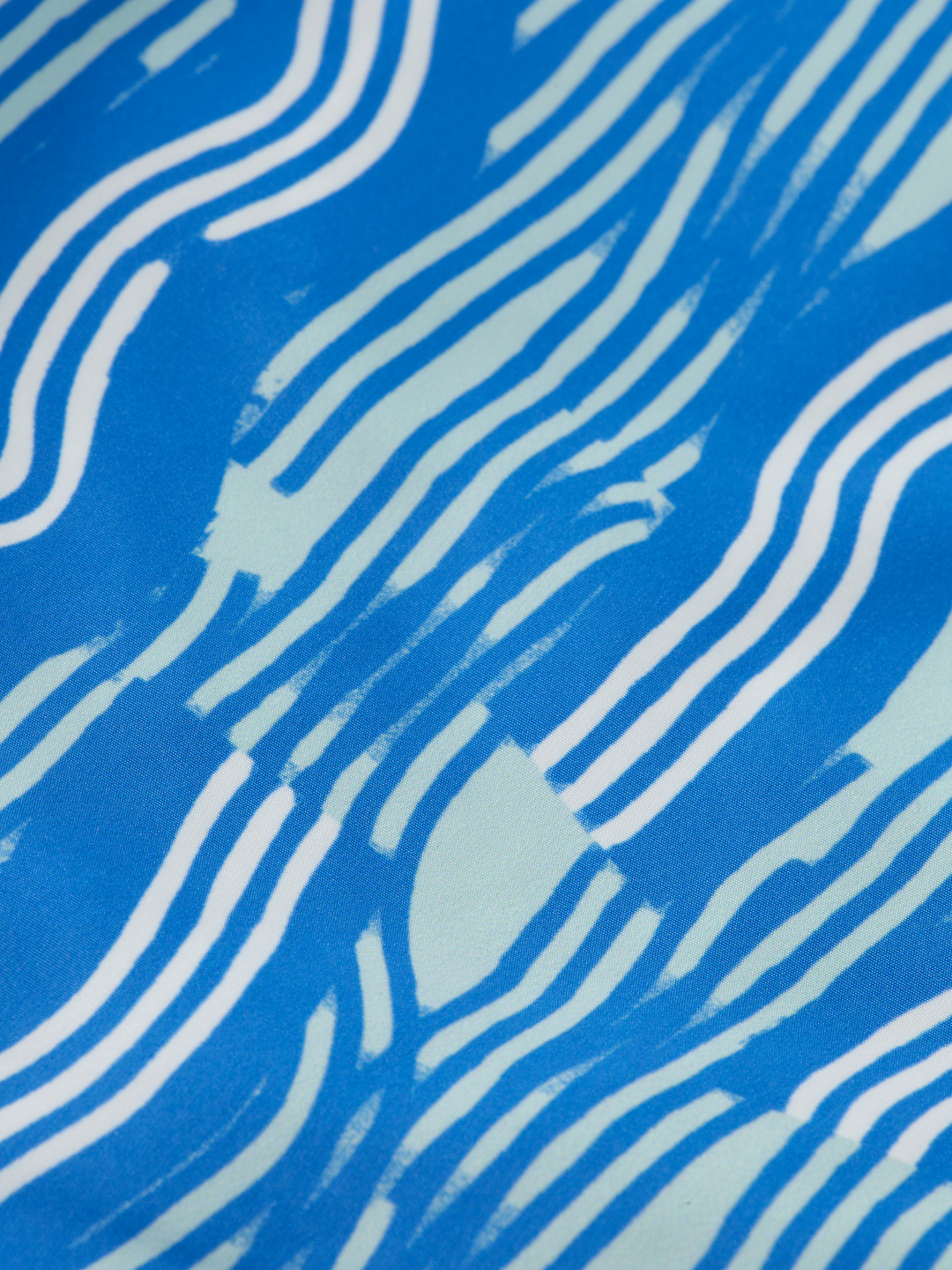 Printed mid-length swim shorts
