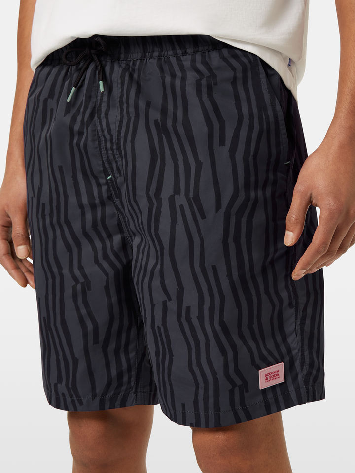 Printed long-length swim shorts