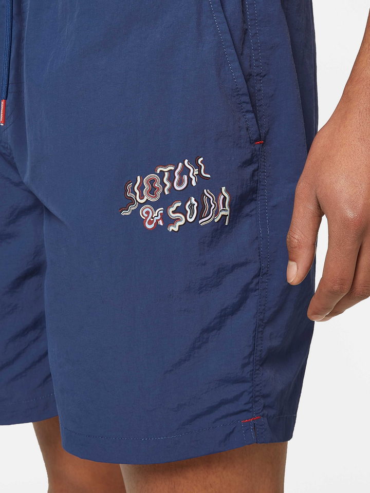 Placement-printed mid-length swim shorts