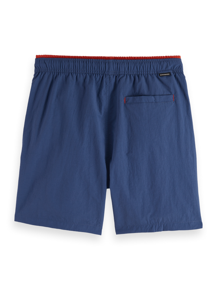 Placement-printed mid-length swim shorts