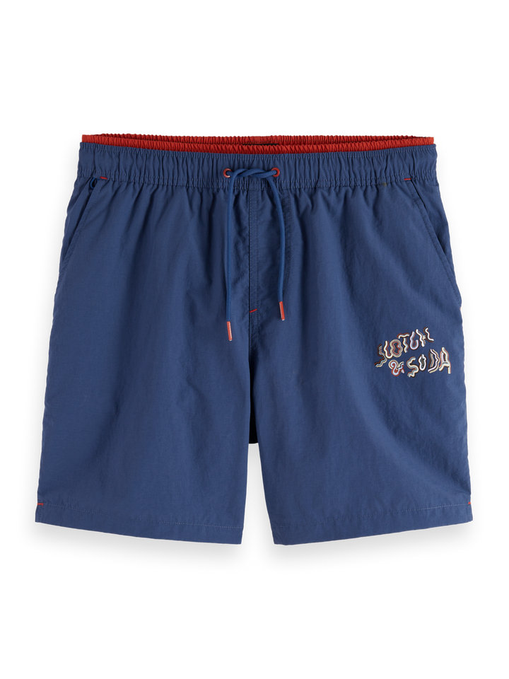 Placement-printed mid-length swim shorts