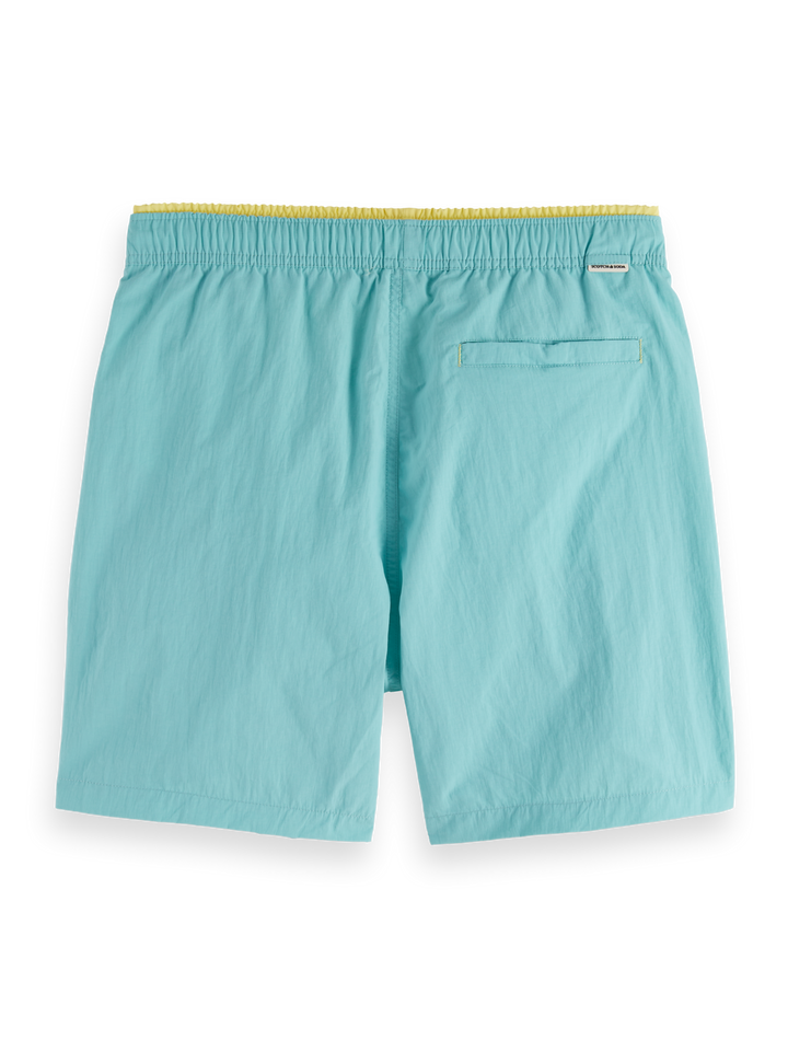 Placement-printed mid-length swim shorts