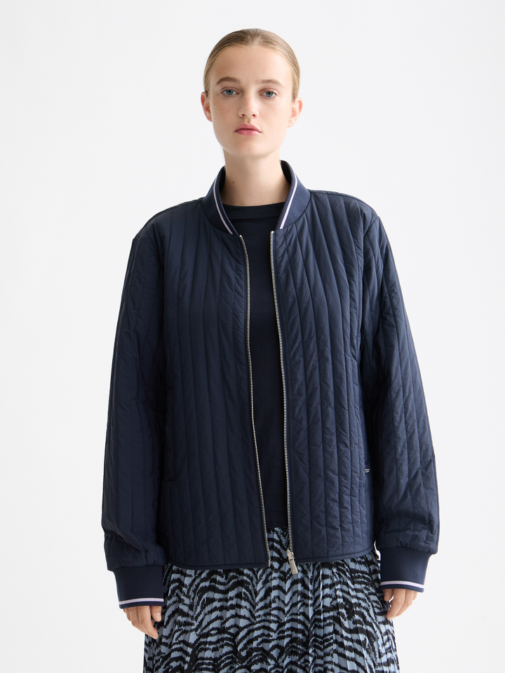 Reversible quilted bomber