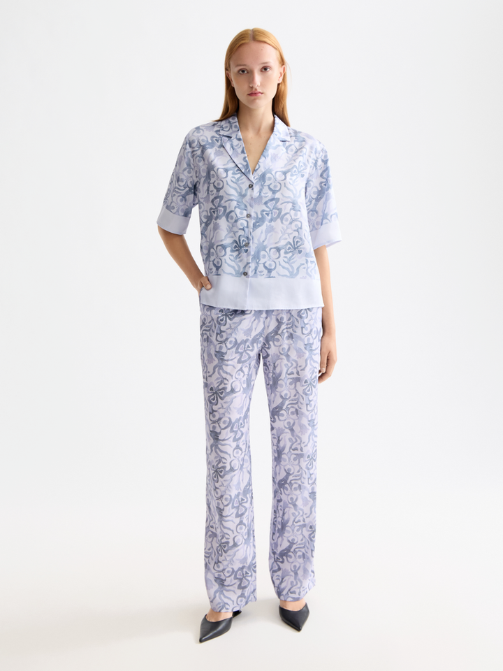 Gia-Mid rise wide leg elasticated trousers in block print